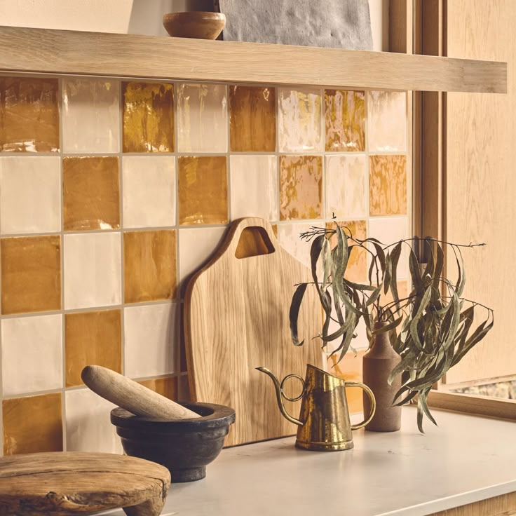 the kitchen counter is clean and ready to be used as a planter or vase