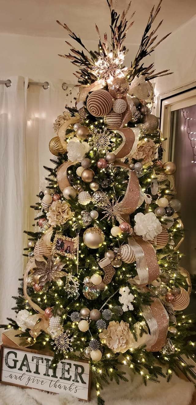 a christmas tree decorated with ornaments and lights