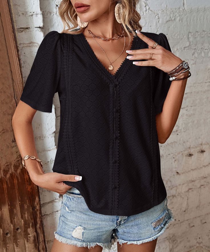 Introducing the Nala Sheer Short Sleeve Top! Unleash your wild side with this playful top in a classic black shade. Perfect for any occasion, this sheer top adds a touch of sass to any outfit. Show off your unique style with the Nala Sheer Short Sleeve Top! Size Guide: Model is 5’7” tall, and has a 33.6” bust, 24.1” waist, & 35.2” hips. She is wearing a S / US 4 / AU 8. This top is true to size. Material: 95% Polyester, 5% Elastane. Feature: V-neckline. Short sleeves. Eyelet detail. Not lined. Lightweight Fabric. Relaxed fit. Care Instructions: Machine wash / Cold hand wash Black V-neck Summer Blouse, Black V-neck Blouse For Day Out, Elegant Black Summer Tops, Black Short Sleeve Blouse For Night Out, Black Tops For Summer Day Out, Trendy Black Short Sleeve Blouse, Black Short Sleeve Blouse For Day Out, Black V-neck Top For Day Out, Trendy Black Blouse For Day Out