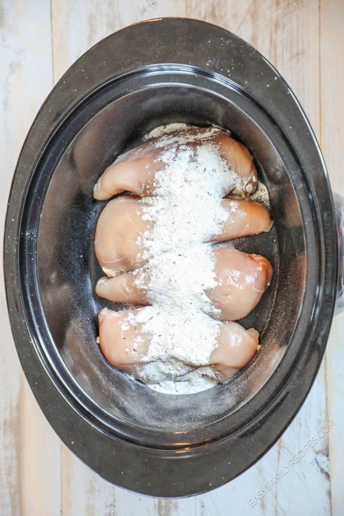 doughnuts are in a bowl with powdered sugar on the top and bottom