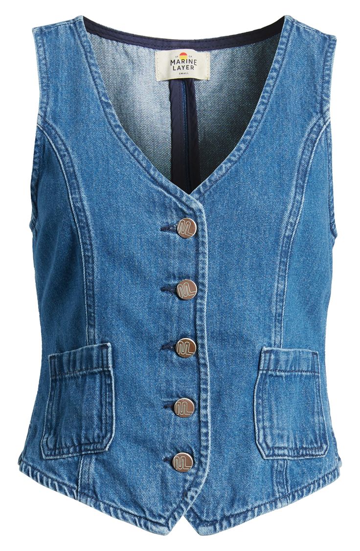 Patch pockets and princess seams adorn this easy denim vest secured by buttons down the front. Front button closure V-neck Sleeveless Front patch pockets Machine wash, tumble dry 100% cotton Made in Turkey Medium Wash Vest With Buttons, Medium Wash Sleeveless Vest With Button Closure, Sleeveless Cotton Denim Jacket With Button Closure, Sleeveless Medium Wash Vest With Button Closure, Sleeveless Vest With Button Closure In Medium Wash, Casual Medium Wash Vest For Workwear, Spring Utility Denim Sleeveless Vest, Spring Utility Sleeveless Denim Vest, Denim Blue Workwear Vest With Pockets