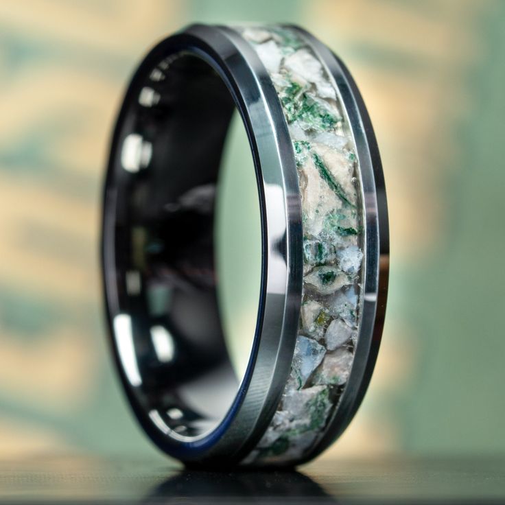 Introducing our stunning Tungsten rings with a unique and eye-catching moss agate inlay! The natural moss agate inlay adds a touch of natural beauty to the design, making them a perfect choice for nature lovers and anyone who appreciates unique jewelry. Perfect for matching Moss Agate engagement rings.CustomizableThis ring has optional personalized engraving, making it your very own custom 1 of 1. Be sure to order your custom inside engraving options separately, after this ring is added to your Moss Agate Engagement Rings, Agate Engagement Rings, Country Rings, Tungsten Rings, Thick Ring, Wolfram, Hand Ring, Tungsten Ring, Minimalist Rings