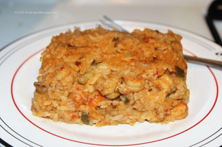 a plate with some food on it and a fork