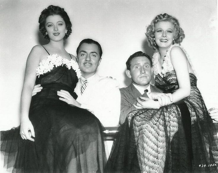 an old black and white photo of three people