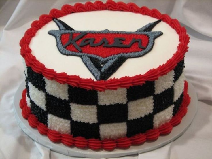 a checkered cake decorated with the word kreme on it's side