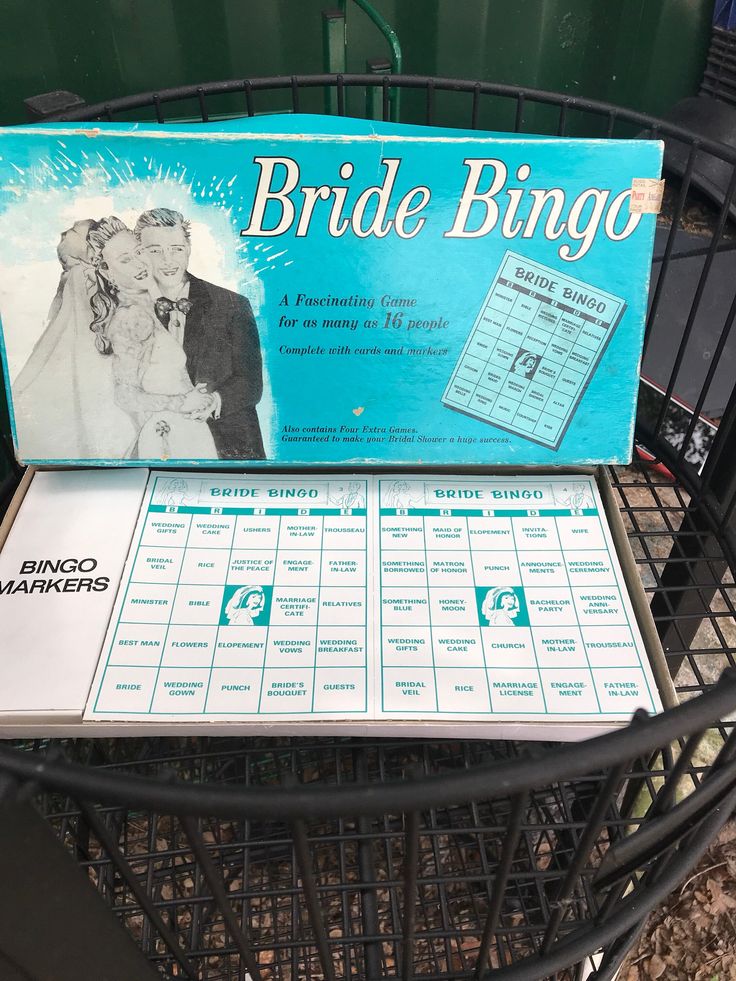 a bride and groom game sitting on top of a shopping cart