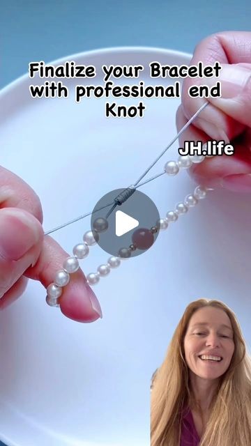 a woman holding onto a strand of pearls with the caption finalize your bracelet with professional end knot