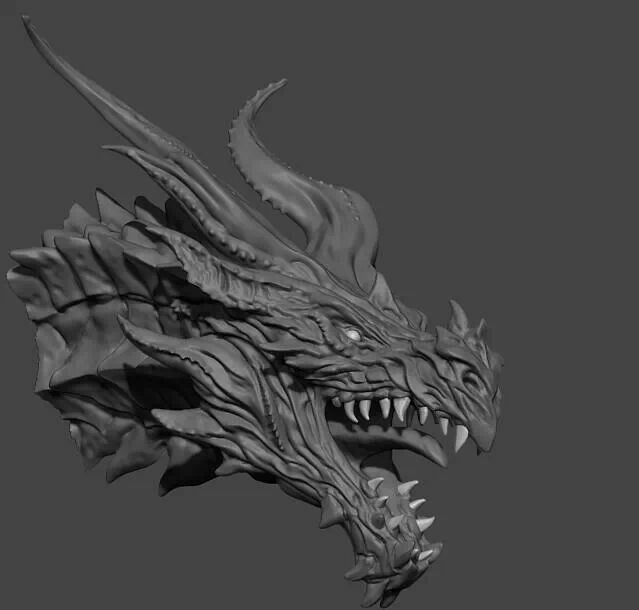 a black and white photo of a dragon head