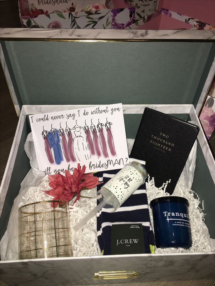 an open gift box filled with personal items