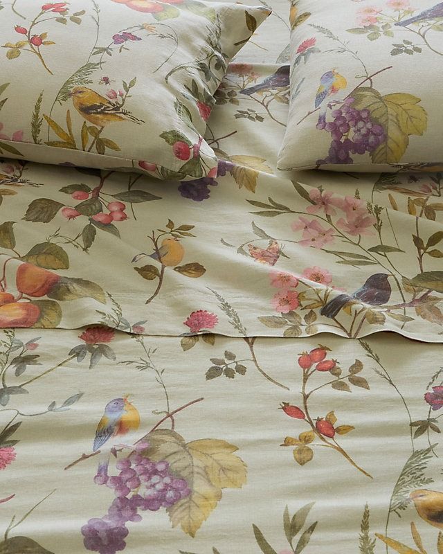 an image of a bed with flowers on it