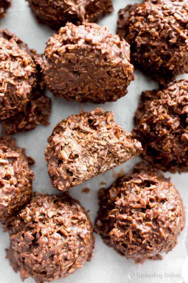 chocolate cookies are arranged on a white surface