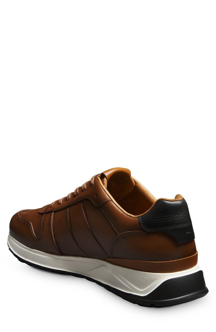 Designed to tackle the changing demands of the modern work world, this sporty sneaker boasts a dapper, streamlined profile in crisp leather. Responsive XL Extralight® soles add lightweight cushioning FlyForm™ insoles provide enhanced comfort and support Leather upper and lining/synthetic sole Imported Classic Leather Golf Shoes With Textured Sole, Classic Low-top Sneakers For Business Casual, Business Casual Sneakers With Rubber Sole, Business Casual Low-top Sneakers With Leather Sole, Brown Rubber Sole Sneakers For Business Casual, Modern Business Casual Sneakers With Leather Sole, Brown Business Casual Sneakers With Rubber Sole, Business Casual Sneakers With Leather Sole, Brown Plain Toe Sneakers For Business Casual