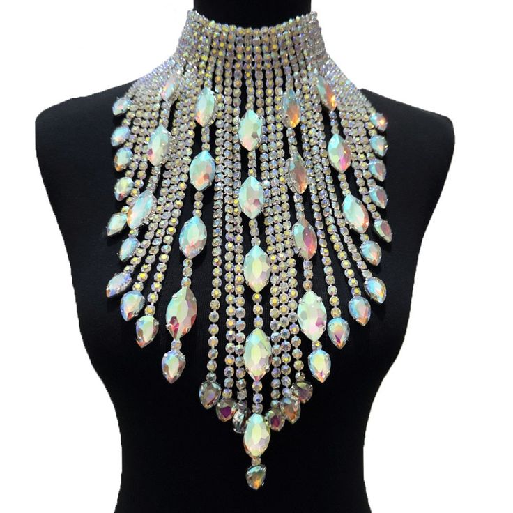 Level up your festival vibes with our Dazzling Crystal long irregular Tassel Necklace for Women. This stunning choker jewelry, bedecked with Shiny Glass Rhinestones, shimmers with a kaleidoscope of colors as you groove the night away. Crafted for both durability and flexibility, it's the ideal accessory to amp up your festival, concert, or special event style. Don't miss out on this mesmerizing festival must-have – grab yours today and dive into the festival magic! Festival Must Haves, Rhinestone Statement Necklace, Choker Jewelry, Womens Chokers, Wedding Accessory, Party Necklace, Rhinestone Choker, Dress Belt, Rhinestone Wedding