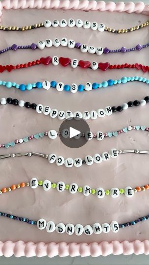 a cake decorated with beads and words that spell out the word be happy to everyone