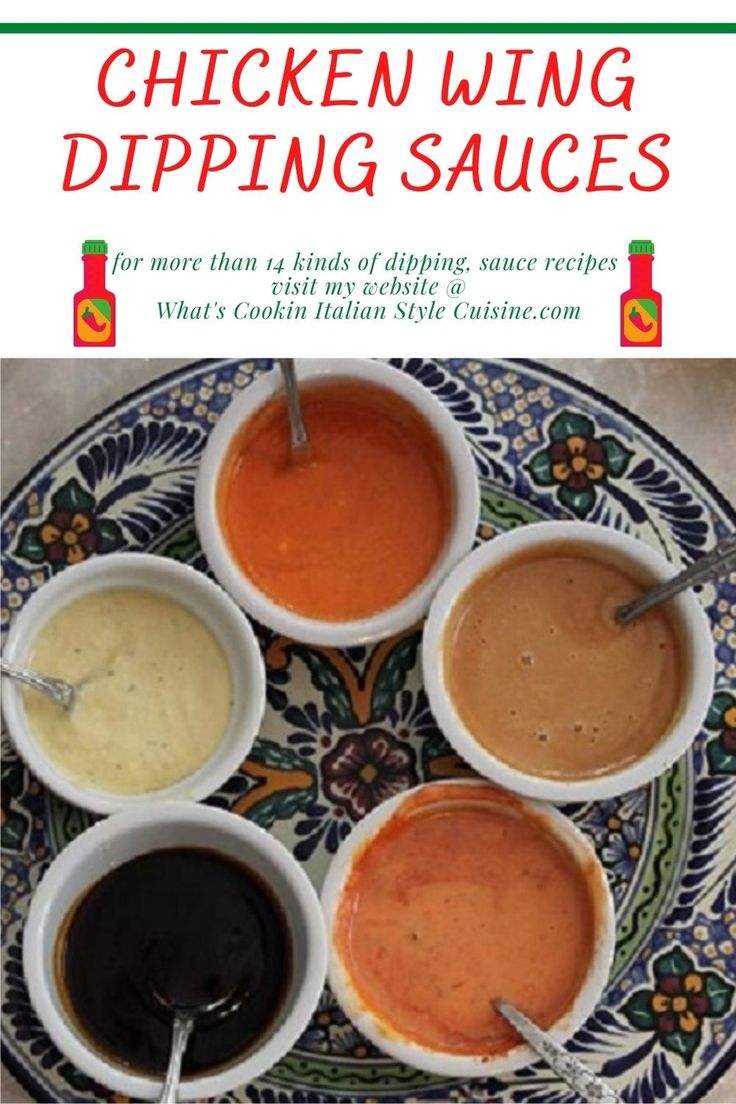 chicken wing dipping sauces on a plate with spoons