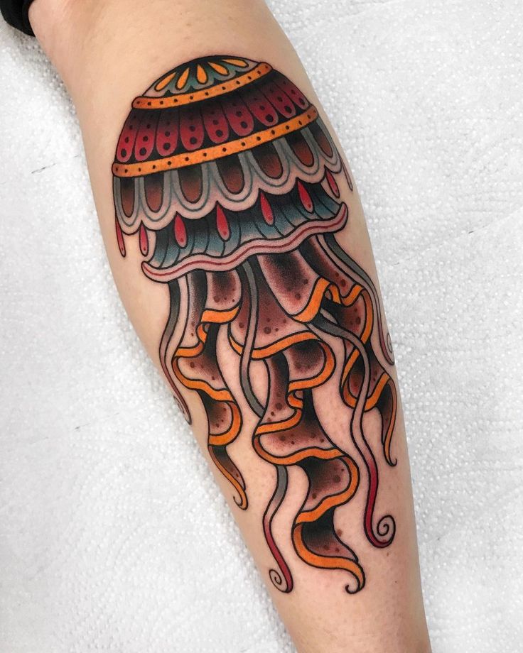 an octopus tattoo on the arm