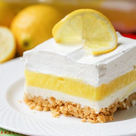 a slice of lemon cake on a white plate