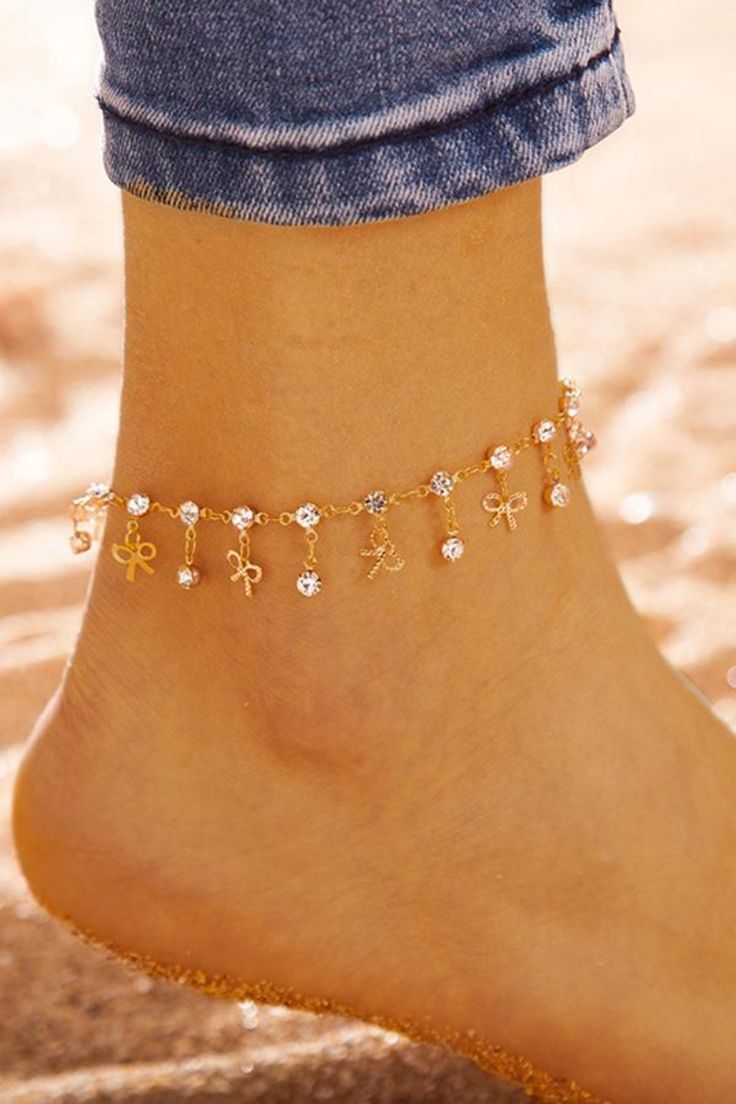 A stylish anklet featuring shimmering diamond beads and a delicate charm decoration of butterflies, this golden accessory can create a bohemian beach look or a punky street look. Size (inches): One size Bohemian Beach, Street Look, Water Droplets, Beach Look, About Me, Delicate Bracelet, Anklets, Butterflies, Water