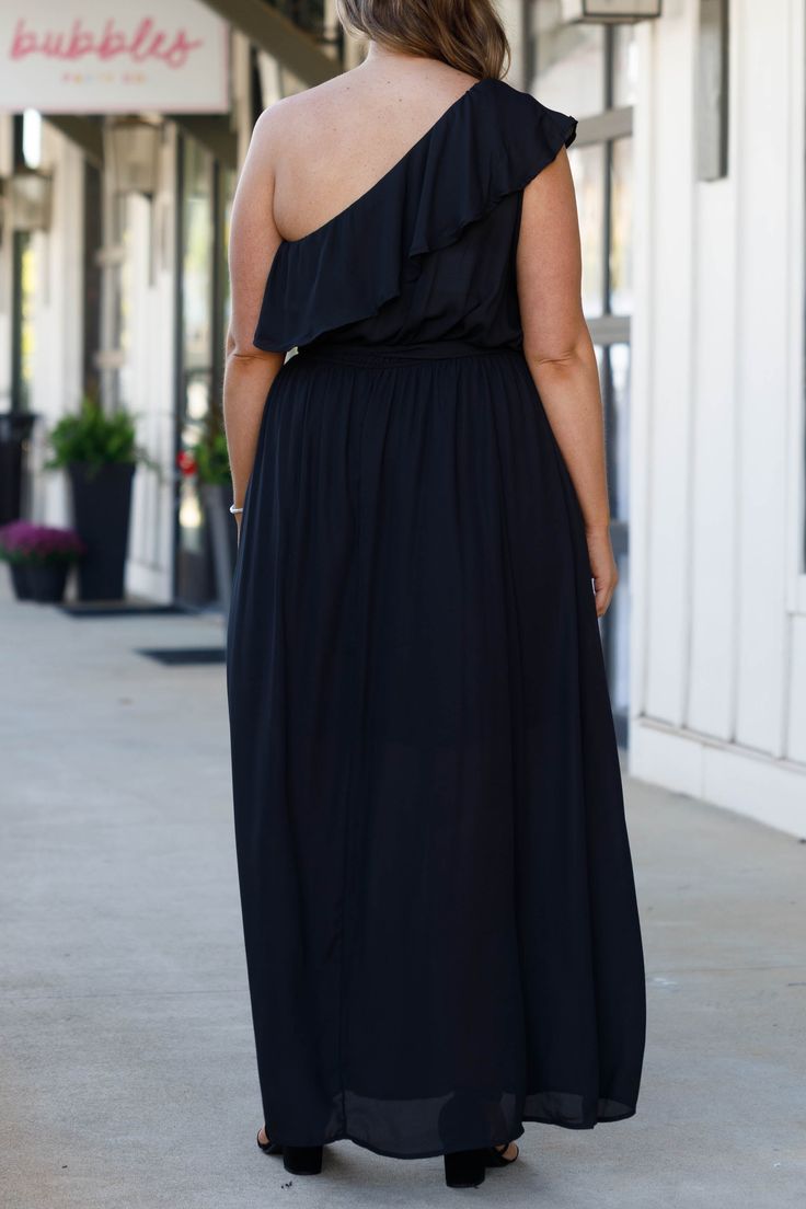 You'll look so fierce in this gorgeous dress! This dress has a beautiful black color with a flirty length and sleek material! This dress is perfect for any occasion, whether it is a plus on to a wedding or a fun holiday party! Style this dress with cute accessories and heels for a classy chic look! 100% Polyester Black Maxi Length Prom Dress, Black Summer Maxi Dress For Prom, Black Maxi Dress For Summer Prom, Flowy Maxi Dress For Date Night, Black Chiffon Party Dress, Black Flowy Sleeveless Midi Dress, Black Flowy Sleeveless Dress, Black Chiffon Midi Dress For Cocktail, Flirty Flowy Maxi Dress For Date Night