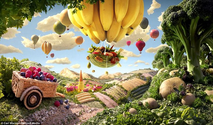 an artistic scene with fruits and vegetables floating in the air over a farm land area