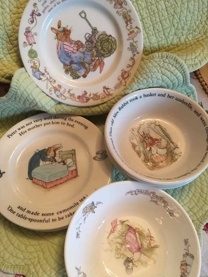 three plates with peter rabbit designs on them