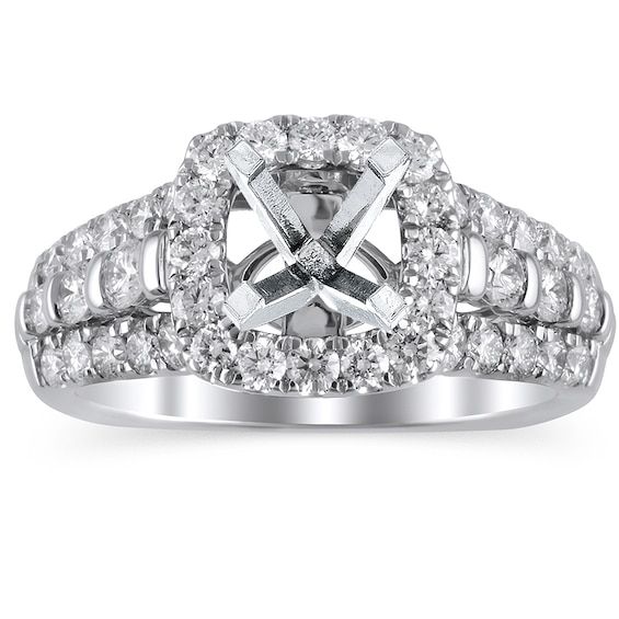 a white gold ring with two rows of diamonds on the band and a center diamond in the middle