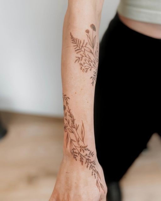 a woman with a tattoo on her arm