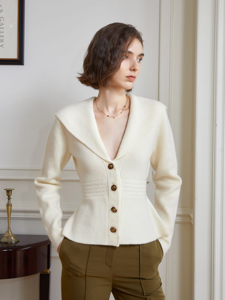 A gorgeous and beautiful knit jacket for Western ladies. Her collar was large, her waist was slim and cinched, and the design flared out slightly towards the hem. This item creates a feminine and smooth curve. 
 
 Size 
 
 XS size 
 
 Length: 56.5cm 
 Shoulder width: 36cm 
 Bust: 84cm or less 
 Waist: 66cm or less 
 Sleeve length: 58cm 
 
 S size 
 
 Length: 57.5cm 
 Shoulder width: 37cm 
 Bust: 88cm or less 
 Waist: 68cm or less 
 Sleeve length: 59cm 
 
 M size 
 
 Length: 58.5cm 
 Shoulder wid Elegant Fitted V-neck Cardigan, Elegant Beige Knit Outerwear, Elegant Beige Knit Sweater Coat, Elegant Knit V-neck Outerwear, Elegant Fitted Beige Sweater, Feminine Fitted Long Sleeve Cardigan, Fitted Beige Knit Outerwear, Fitted Knit Beige Outerwear, Fitted Cream Sweater Coat With Long Sleeves