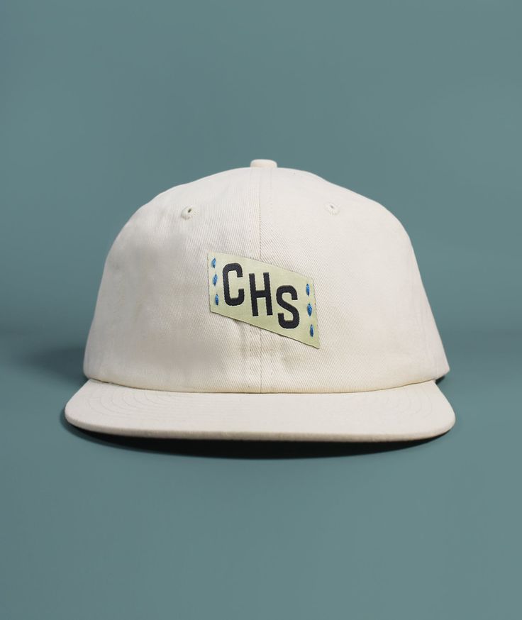 Our CHS Embroidered Charleston hat features hand embroidered and woven patch details, a perfectly worn in feel, front and back woven patch details, and adjustable brass buckle clasp.Made from washed 100% cotton twill fabricFabric strap with adjustable brass buckle claspDue to the handmade nature of this design items may have slight variations Pre-washed Cotton 5-panel Hat, Cotton Hat With Logo Patch And Flat Brim, Flat Brim Cotton Hat With Logo Patch, Cotton Hats With Logo Patch, Outdoor Cotton Dad Hat With Logo Patch, Adjustable Six-panel Hat With Embroidered Patch, Summer Embroidered Logo 5-panel Snapback Hat, Cotton 5-panel Snapback Hat With Logo Patch, Cotton Baseball Cap With Embroidered Patch