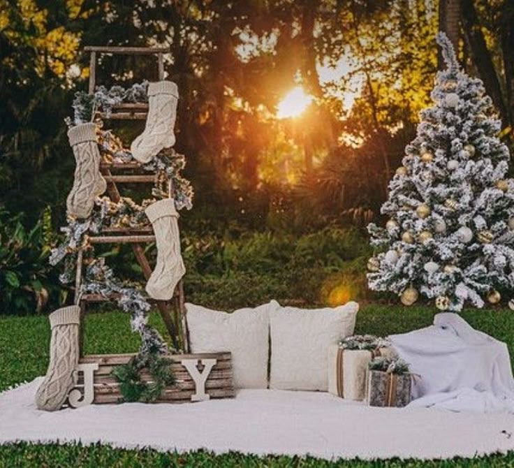 an outdoor setting with christmas trees and decorations