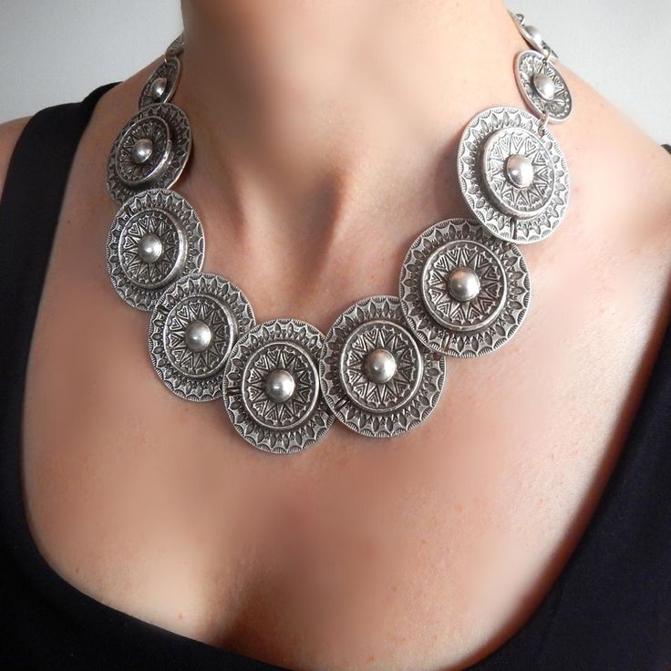 The silver-plated Sun Circles necklace features a mesmerizing intricate tribal sun design. Sun Design, Sun Designs, Circle Necklace, Circles, Silver Plate, Silver Plated, Statement Necklace, Plating, Sun