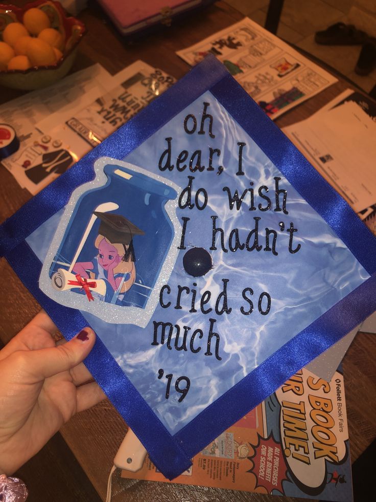 a blue graduation cap with the words oh dear i do wish i had it cred so much