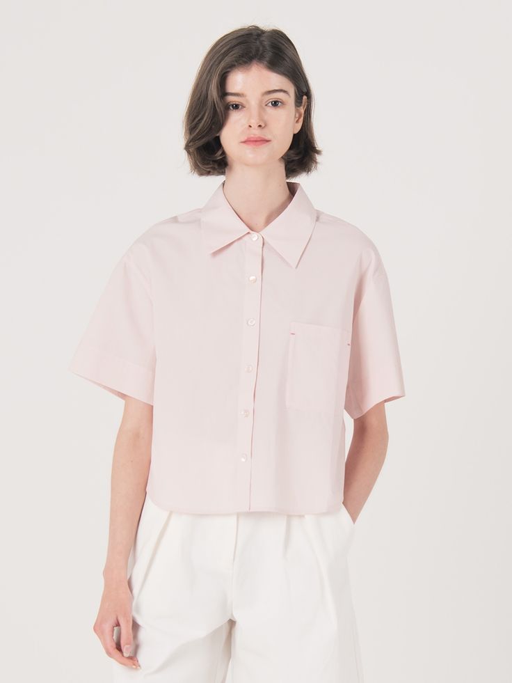 Editor's Notes A seasonal twist on classic shirting  this soft-pink shirt is cut from airy material and has a boxy roomy fit for a relaxed feel.- Longish short sleeves with a semi-cropped hem- Boxy  relaxed fit- Soft and airy fabric- Single large front pocket with subtle contrasting stitchesMeasurements(in.)S / M- Length: 20.47 in. / 20.87 in. - Shoulder: 19.29 in. / 19.69 in. - Bust: 43.31 in. / 44.88 in. - Hem: 46.85 in. / 48.43 in. - Sleeve: 7.48 in. / 7.87 in. * Pink Relaxed Fit Feminine Shirt, Classic Cropped Shirt With Short Sleeves, Classic Cropped Shirt With Relaxed Fit And Short Sleeves, Classic Relaxed Fit Cropped Shirt With Short Sleeves, Classic Relaxed Fit Short Sleeve Cropped Shirt, Pink Shirt For Workwear In Summer, Pink Summer Workwear Shirt, Pink Short Sleeve Blouse For Work, Pink Relaxed Fit Collared Shirt