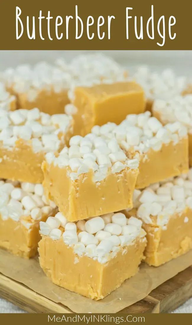 several pieces of butterbee fudge are stacked on top of each other with marshmallows