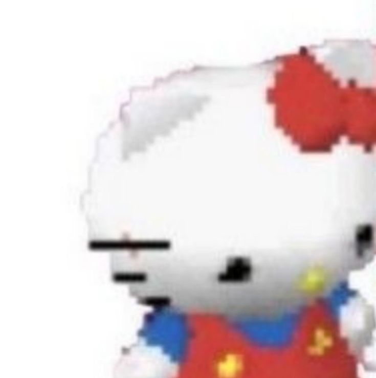 a hello kitty stuffed animal with a red bow on it's head and chest