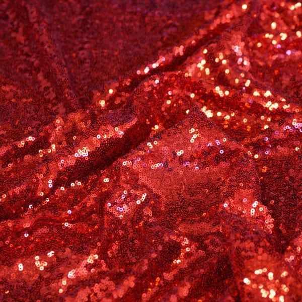 This fabric is perfect for sparkling prom dresses, bridal gowns, eye-catching halter tops, jackets, skirts, pants, and special occasion garments. Because this beautiful textile is on a mesh backing, it has a slight stretch that will hug form to any surface. Hand wash. Width is 60 inches Chair Back Covers, Sparkle Prom Dress, Silk Velvet Fabric, Bouquet Wrap, Shiny Fabric, Sewing Fabrics, Red Sequin, Fabric Bolts, Sequin Fabric