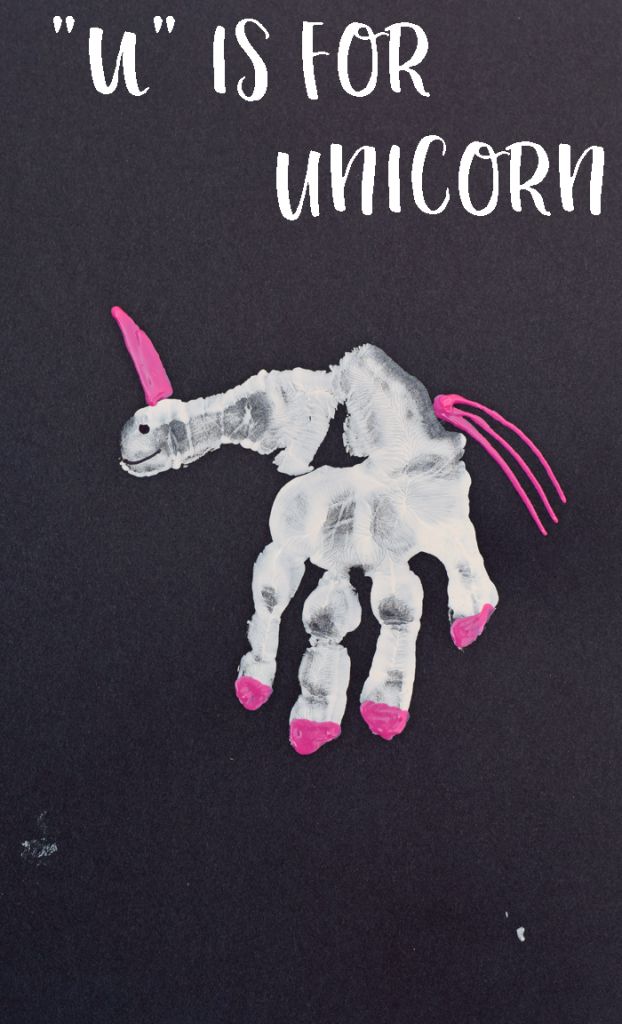 a handprint with the words u is for unicorn on it