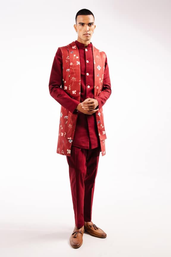 Maroon long line bundi with floral print. Paired with a plain kurta and matching pant. - Aza Fashions Luxury Red Nehru Jacket For Formal Occasions, Luxury Red Nehru Jacket For Ceremonial Occasions, Fitted Cotton Traditional Wear For Semi-formal Occasions, Fitted Cotton Semi-formal Traditional Wear, Festive Semi-formal Cotton Traditional Wear, Formal Cotton Kurta With Printed Motifs, Fitted Cotton Sherwani For Festive Occasions, Festive Fitted Cotton Sherwani, Red Designer Wear Kurta For Spring