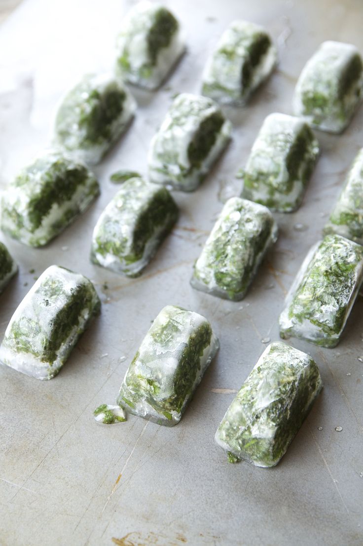 there are many green candies on the baking sheet