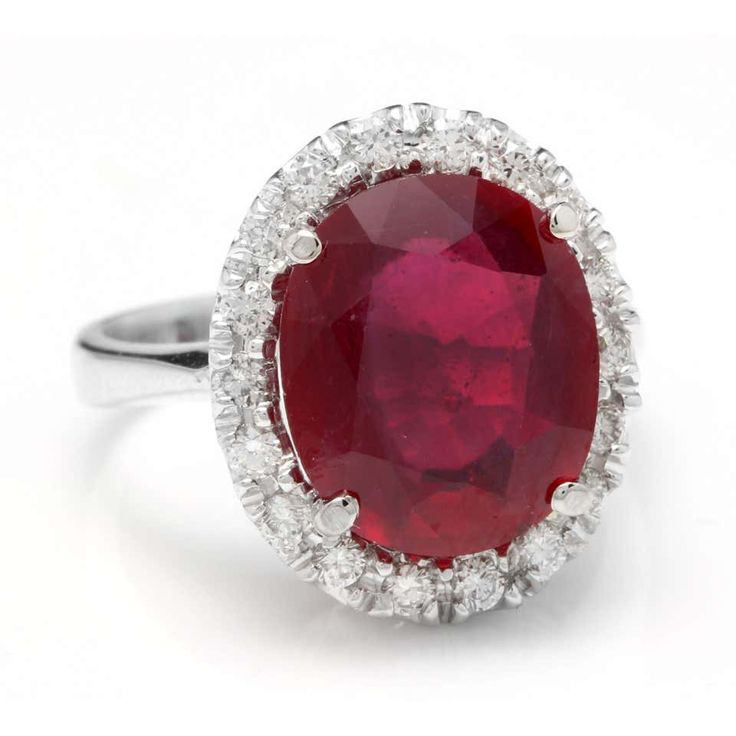 an oval shaped ruby and diamond ring