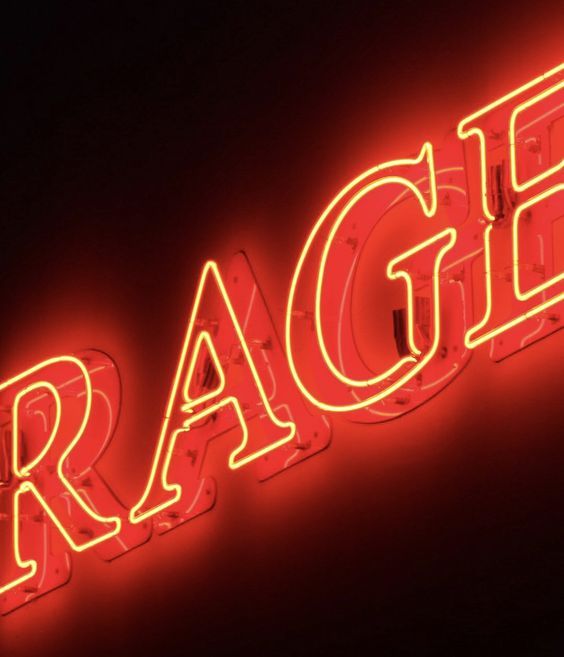 a neon sign that says rage on it