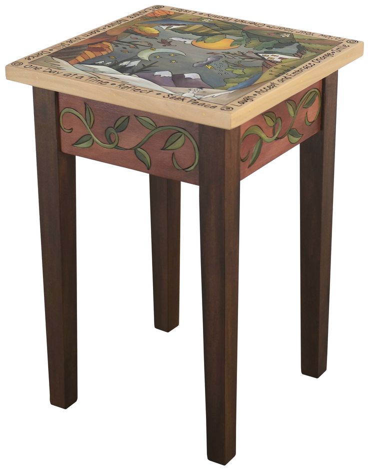 a small wooden table with an animal design on it