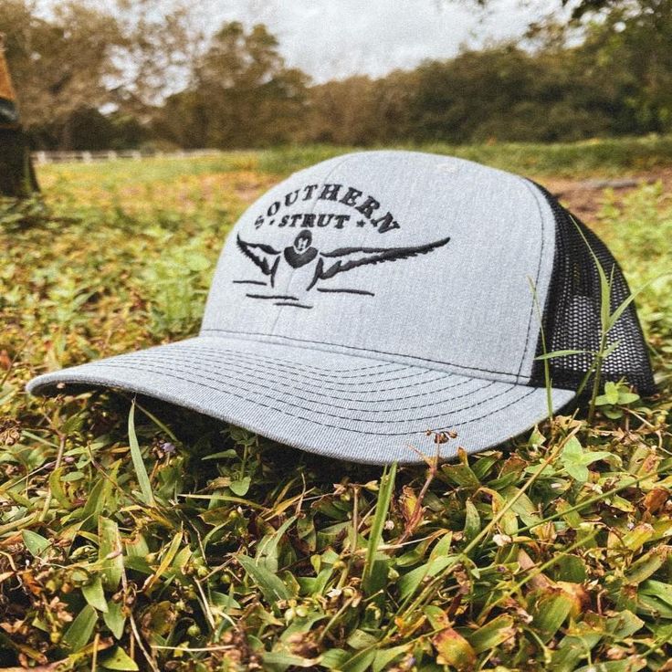 White Duck Trucker Hat by Southern Strut Gray Curved Brim Hat For Camping, Country Style Baseball Cap For Outdoor, Gray Cap For Camping, Trucker Hat With Flat Brim For Camping, Country Style Trucker Hat With Curved Brim, Country Style Snapback Trucker Hat For Outdoor, Country Style Trucker Hat With Curved Brim For Outdoor, Country Style Outdoor Trucker Hat With Flat Brim, Gray Trucker Hat For Outdoor