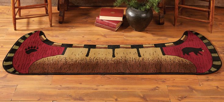 a bear rug sitting on top of a wooden floor