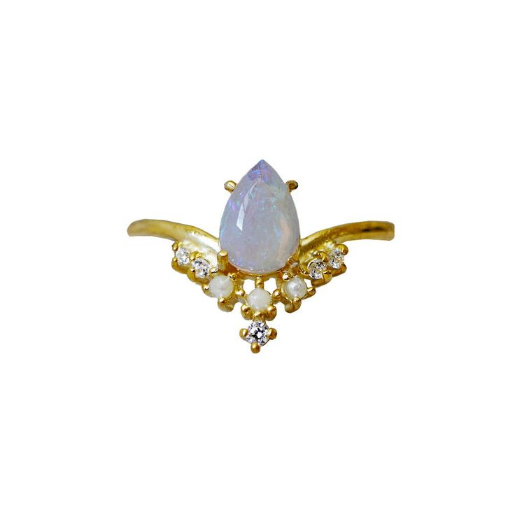 Straight from our New York workshop, the Celestial Opal Pearl ring is a one-of-a-kind magical beauty that stole our hearts. A beautiful pear-shaped Australian opal floats on three graceful pearls. Available in yellow gold, rose gold and silver, or 14K solid gold. gold vermeil or 14k solid gold Natural 7x5mm Australian opal Three natural freshwater pearls Round CZs (what's this?) ** This item is specially made for you. Please allow 1-2 week lead time. ShippingDomestic: Free standard shipping with Graduation Rings, Rose Gold And Silver, Tiny Diamond, Gold Piece, Australian Opal, Moonstone Ring, Silver Pieces, Pearl Ring, Opal Rings