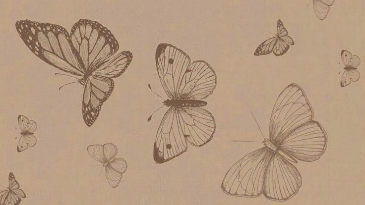 several butterflies are flying in the air on a light colored background with black and white ink