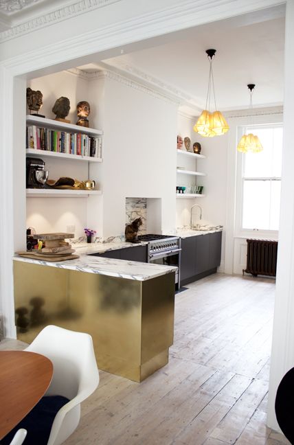 the kitchen is clean and ready to be used as a dining room or living room