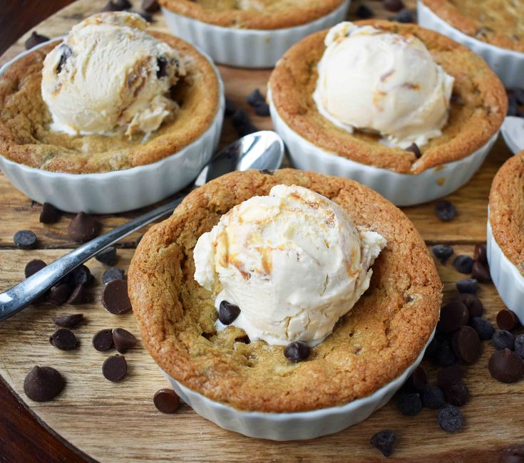 chocolate chip cookie cupcakes with ice cream on top