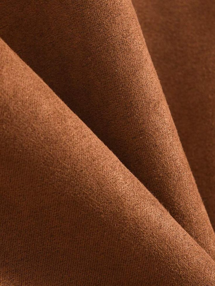 the fabric is brown and it looks like something out of an old movie or tv