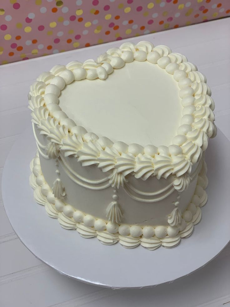 a white cake sitting on top of a table